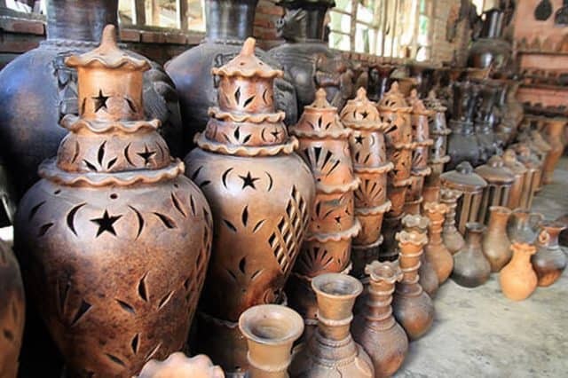 Close-up of Cham motifs on pottery.
