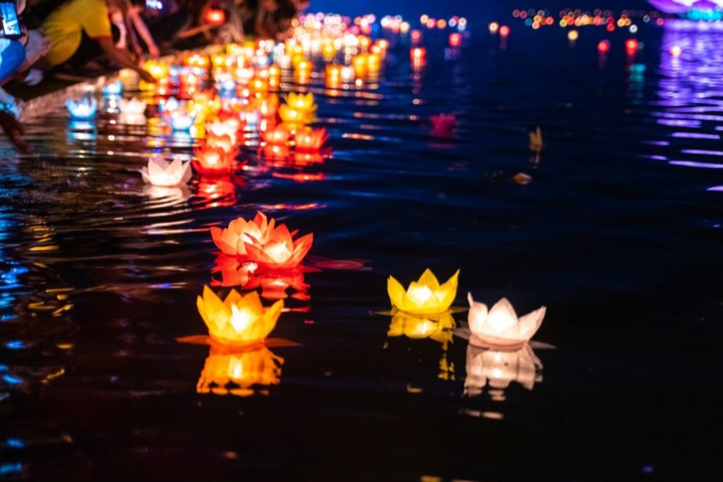 Floating lanterns on the water.