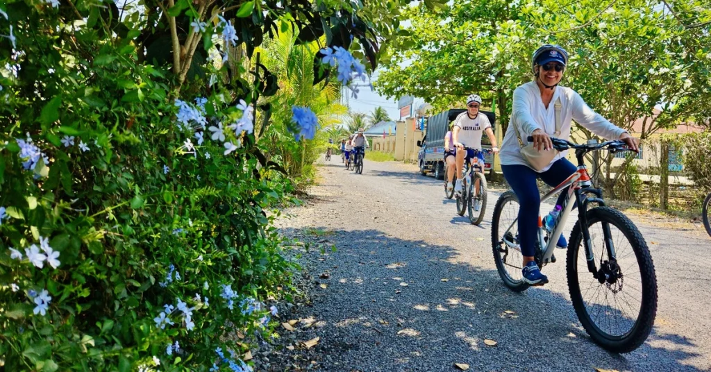 Tourists cycling in the countryside.