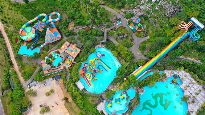 Aerial view of Nui Than Tai Hot Springs surrounded by mountains.