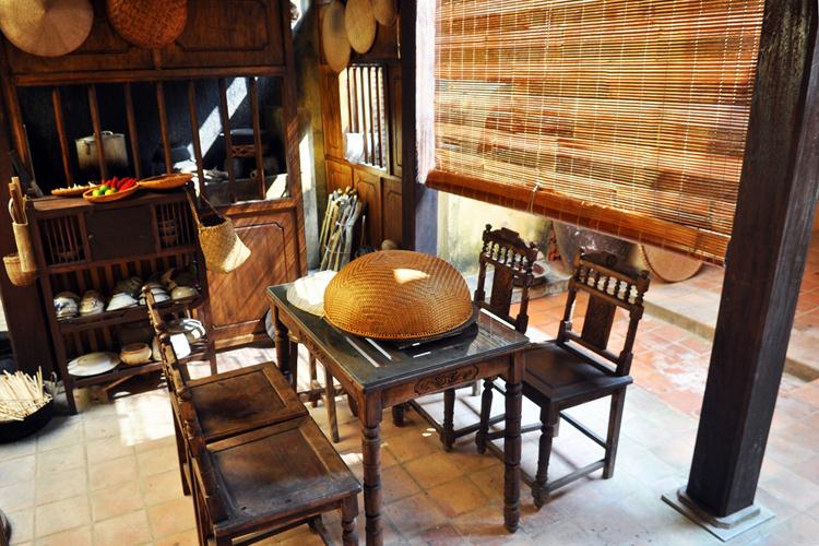 A wide shot of the cooking class area inside a Hue traditional home.