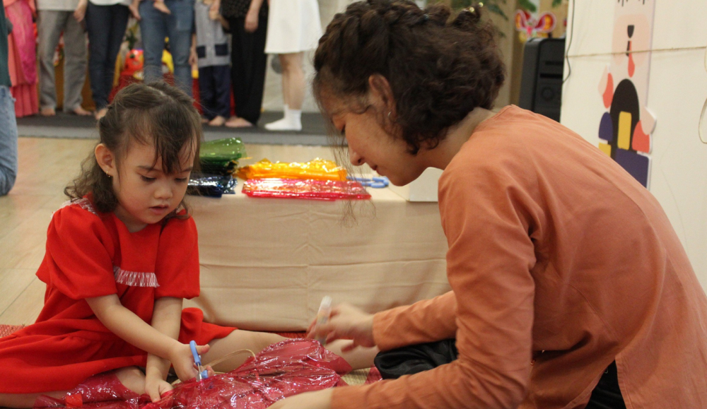 Families making lanterns together
