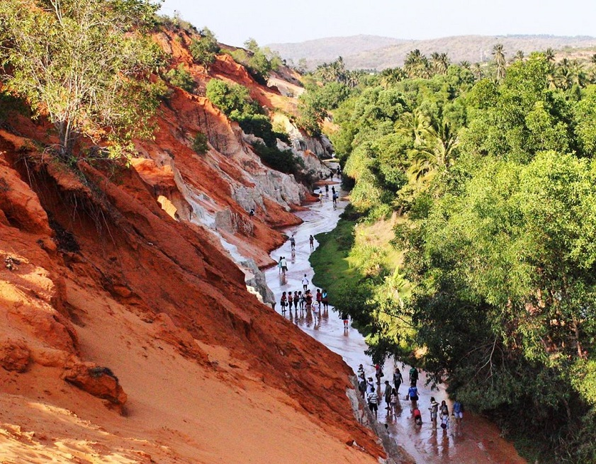 Fairy Stream Mui Ne with red sand canyon cliffs
