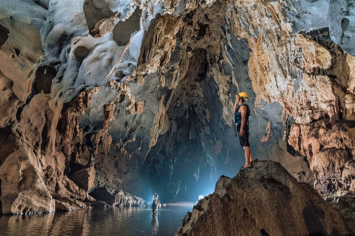 Wide view of the cave interior with large stalactites