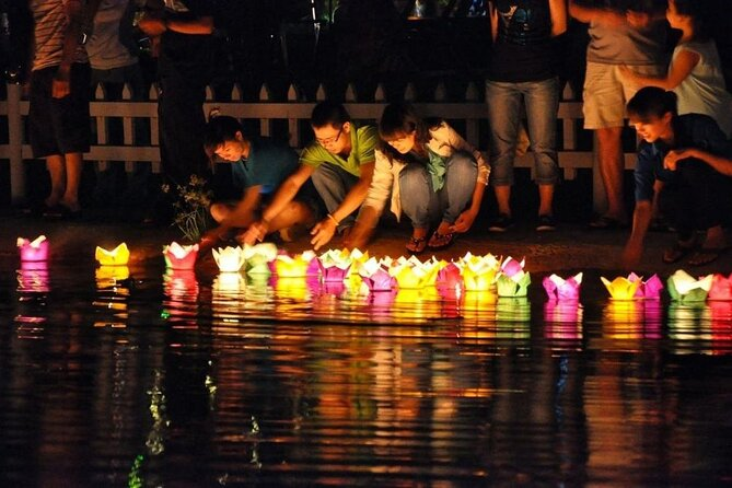 Floating lanterns on Hoai River
